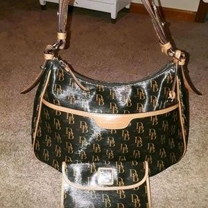 An authentic Dooney and Burk handbag.. With the ma